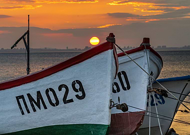 Fishing boat at sunset