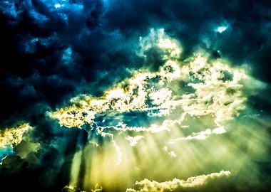 The Sun And Stormy Clouds