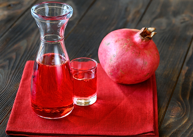 Glass jug of grenadine syr