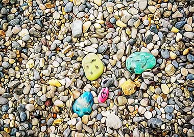 Stones painted on a beach