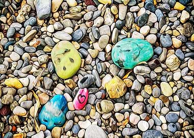 Stones painted on a beach
