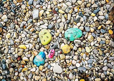 Stones painted on a beach