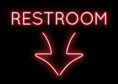 Restroom Below Neon Sign