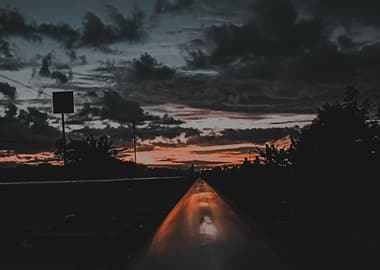 road and dark clouds