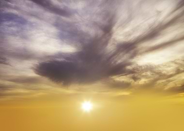 Yellow sky with clouds