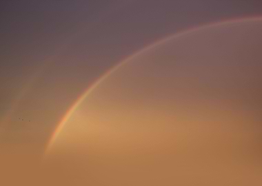 Light rainbow in the sky