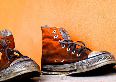 Old used soiled trainers