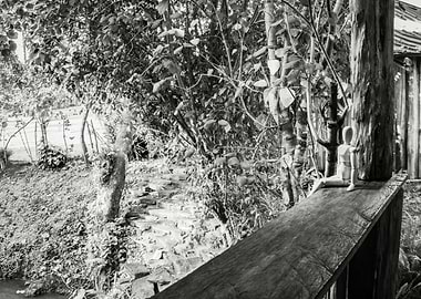 Wooden manikin sitting