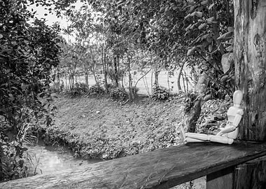 Wooden manikin sitting