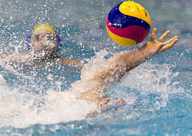 Water Polo catching a ball