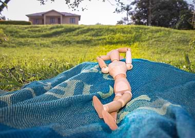 Manikin relaxing outdoors