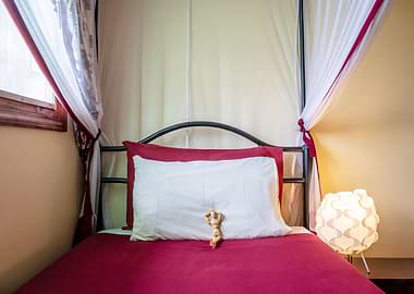 Manikin relaxing on a bed