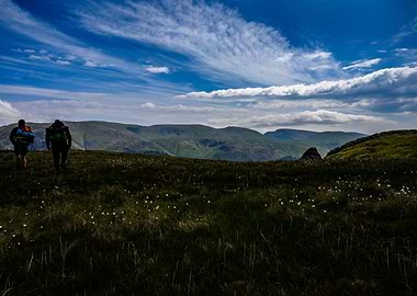 Two People Hiking Mountain