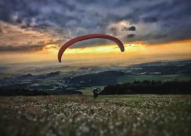 Paraglider take off Sunset