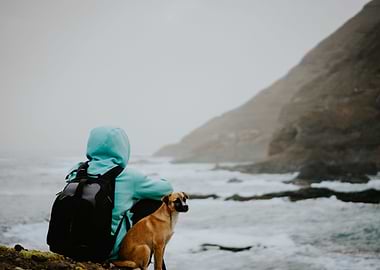 Man With A Dog In Front Of