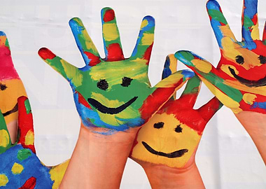 Colored hands with smily