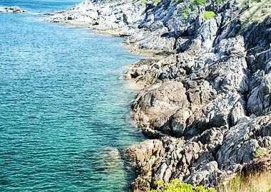 sea waves breaking on rock