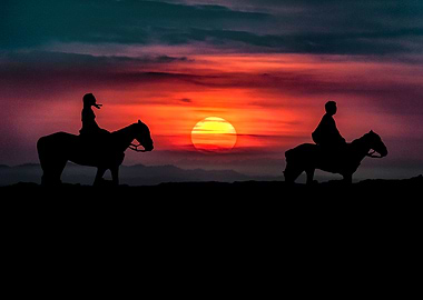 Couple Riding Horses