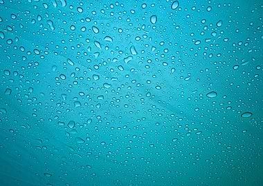 Rain droplets on blue