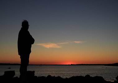Man in the sunset shadow