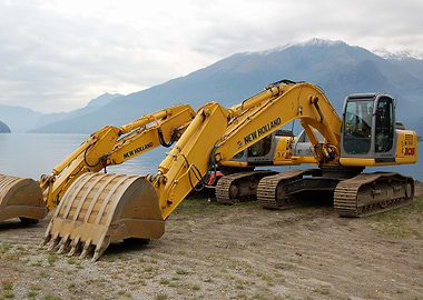 Big excavator on the lake