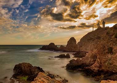 Seascape cliffs lighthouse