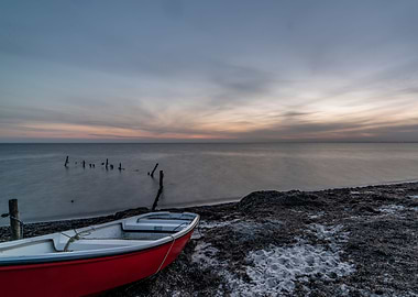 boat on beach sunset