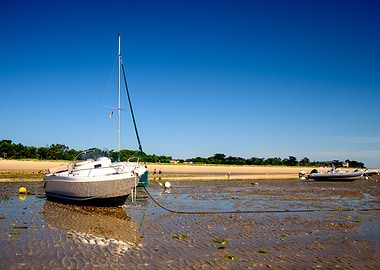 boats laying on the beach