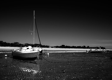 boats laying on the beach
