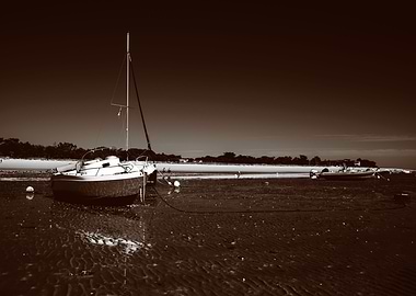boats laying on the beach