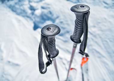 Ski poles in the snow