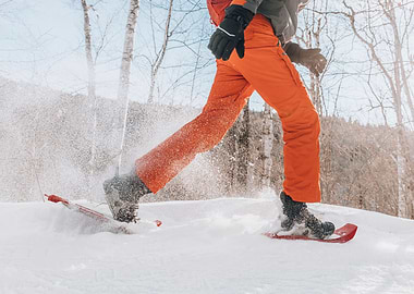 Winter sport snowshoes man