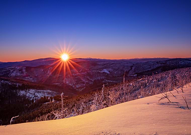 Winter sunrise, snowy hill