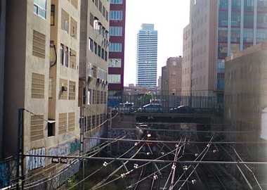 Train Tracks and City