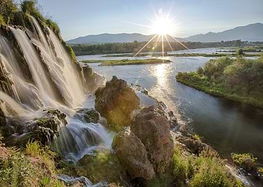 Waterfall by the Mountains
