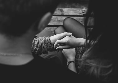 Couple holding hands