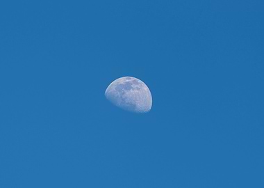 Moon on blue sky