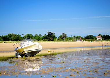boat laying on the beach