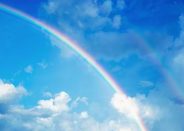 Rainbow on blue sky