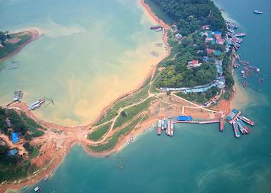 Boats and islets in lagoon
