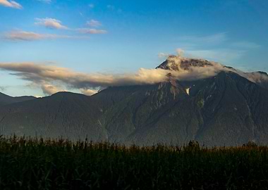 Mountain over corn field