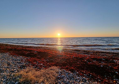 red stone coast at sea