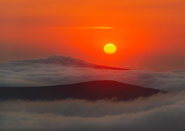 Sunrise over the clouds
