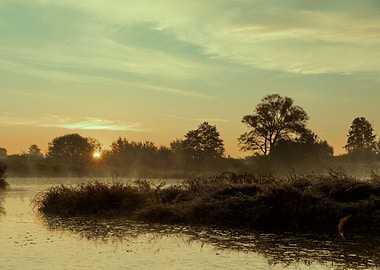 Autumn foggy lake in park
