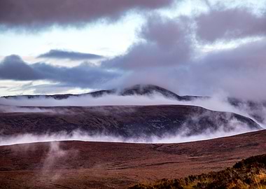 Mountains in morning fog