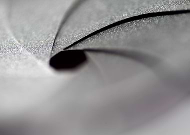 Objective aperture blades