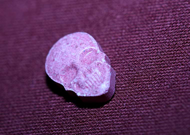 Pink skull ecstasy pill