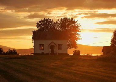 Old house in midnight sun