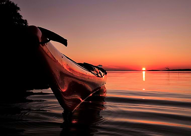 Kayak in calm water sunset