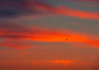 Paraglider and sunset